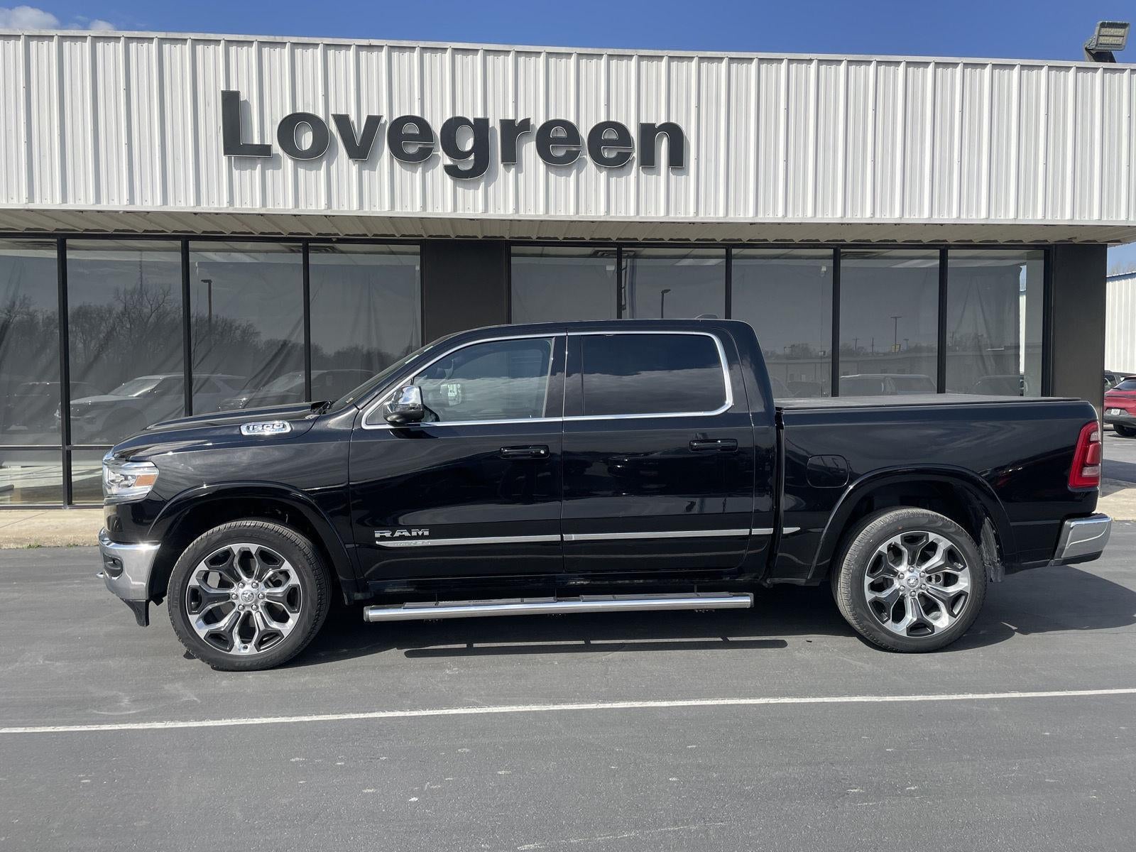 2024 RAM 1500 Limited in Diamond Black Crystal Pearlcoat — front three-quarter view