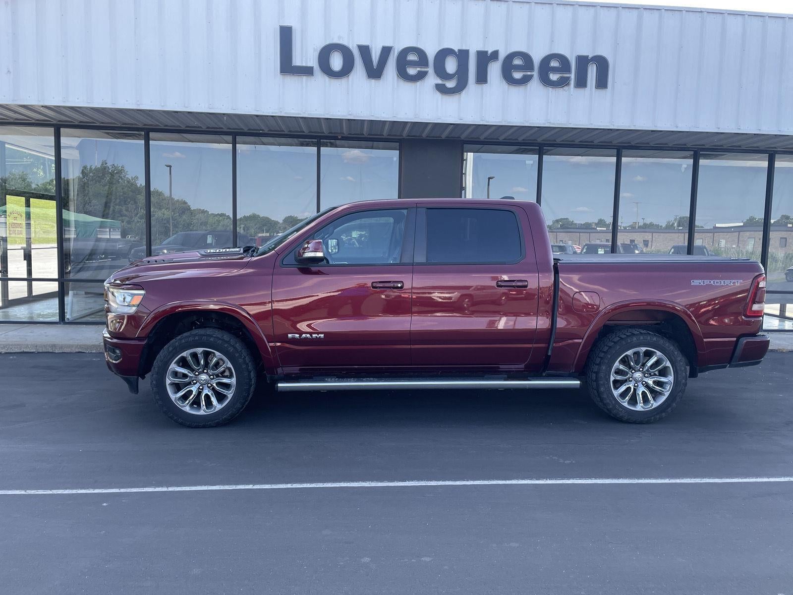 2020 RAM 1500 Laramie in Delmonico Red Pearlcoat — front three-quarter view