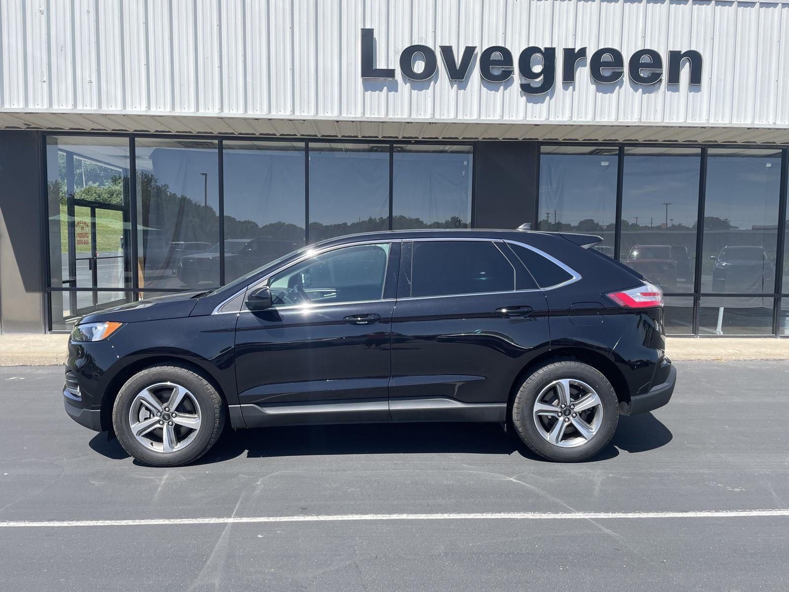 2024 Ford Edge SEL in Agate Black — front three-quarter view