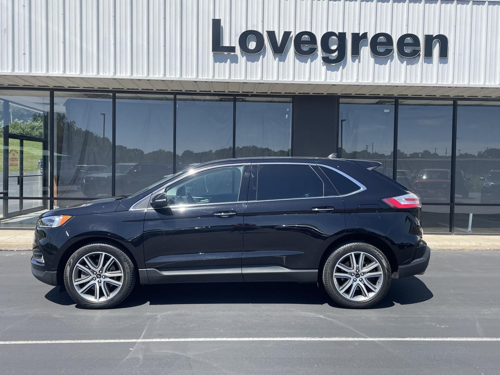 2024 Ford Edge Titanium in Agate Black — front three-quarter view