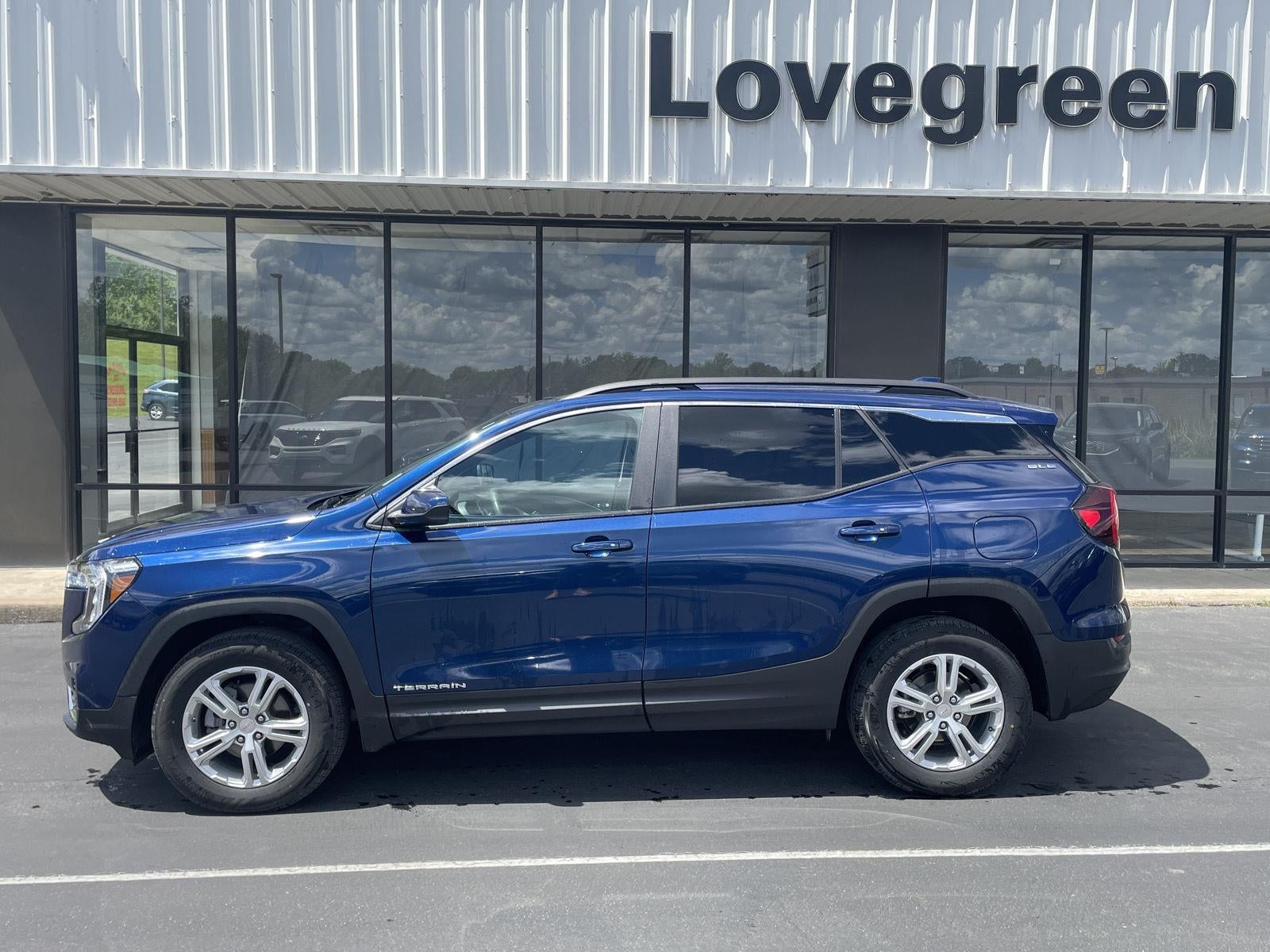2022 GMC Terrain SLE in Marine Metallic — front three-quarter view