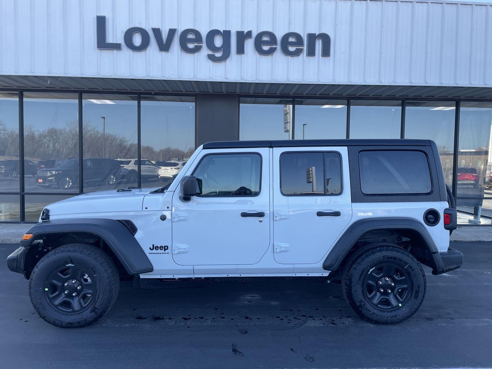 2026 Jeep Wrangler WRANGLER 4-DOOR SPORT in Bright White Clear-Coat Exterior Paint — front three-quarter view