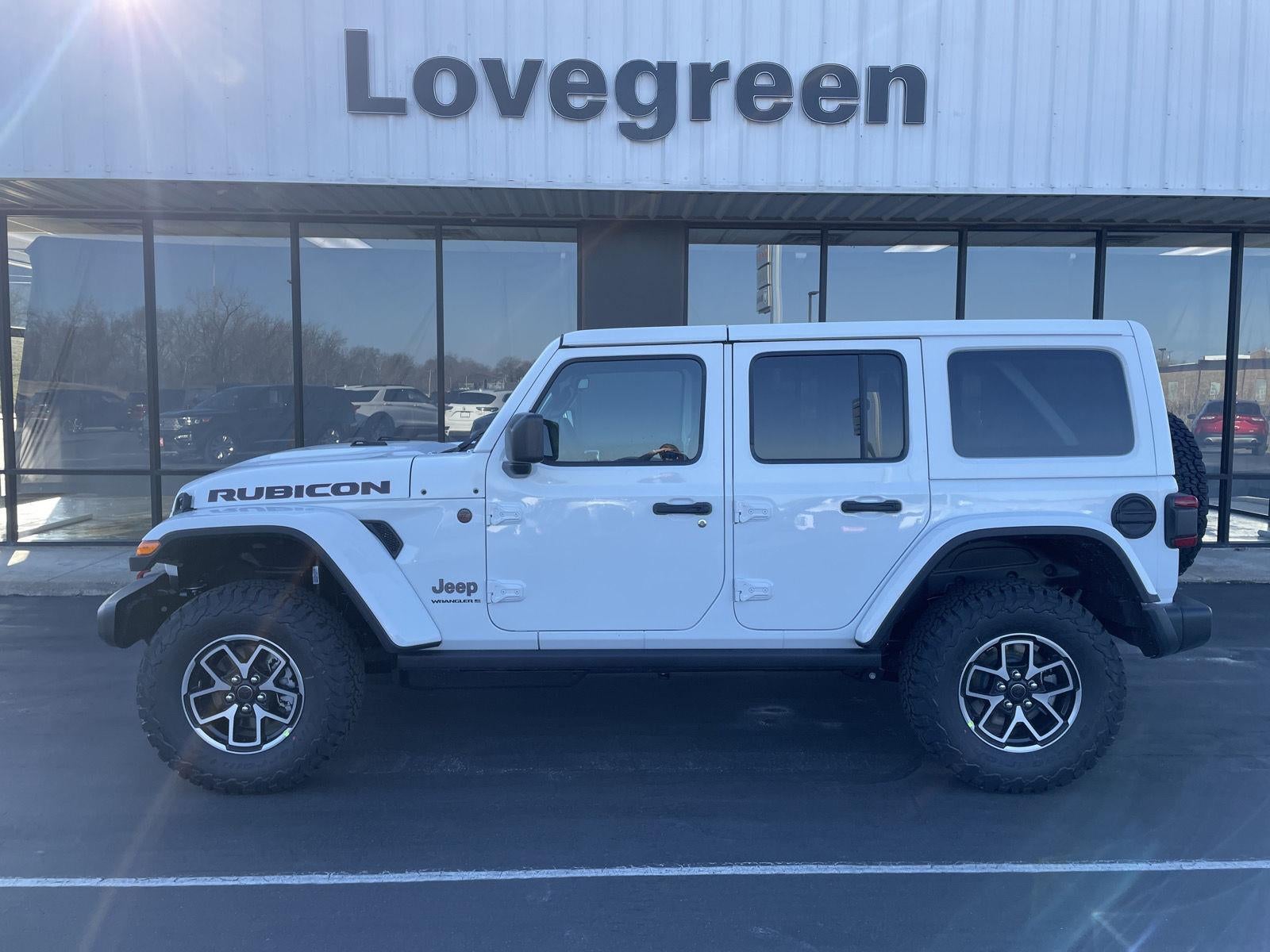 2026 Jeep Wrangler WRANGLER 4-DOOR RUBICON in Bright White Clear-Coat Exterior Paint — front three-quarter view